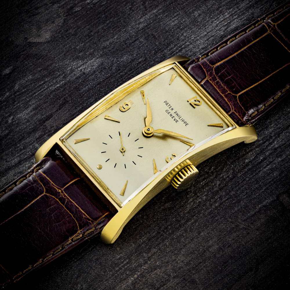 PATEK PHILIPPE. A BEAUTIFUL AND LARGE 18K GOLD RECTANGULAR WRISTWATCH