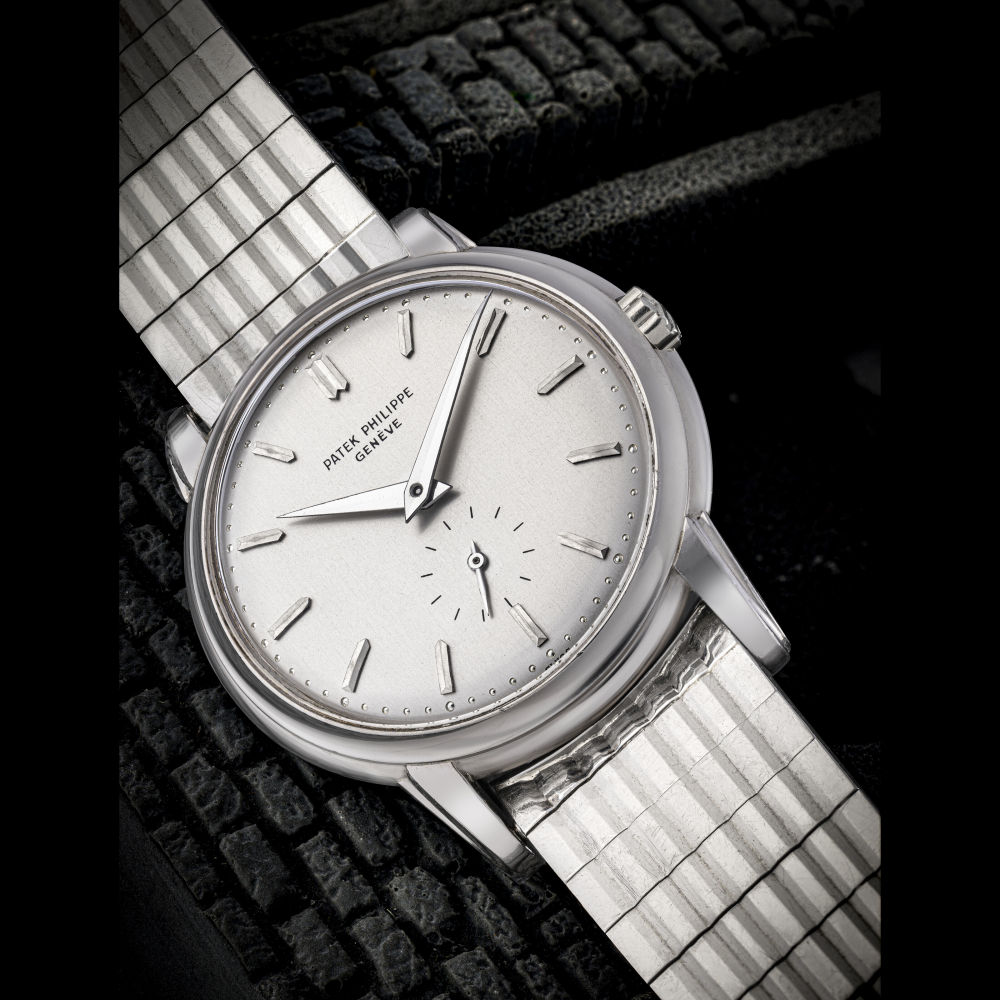 PATEK PHILIPPE. A VERY RARE AND IMPRESSIVE 18K WHITE GOLD AUTOMATIC WRISTWATCH WITH BRACELET