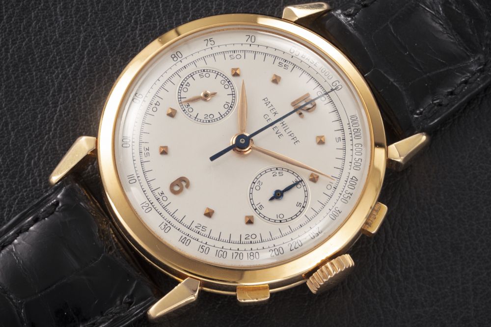 PATEK PHILIPPE, REF. 1579J, A RARE GOLD MANUAL-WINDING CHRONGRAPH - CASE
