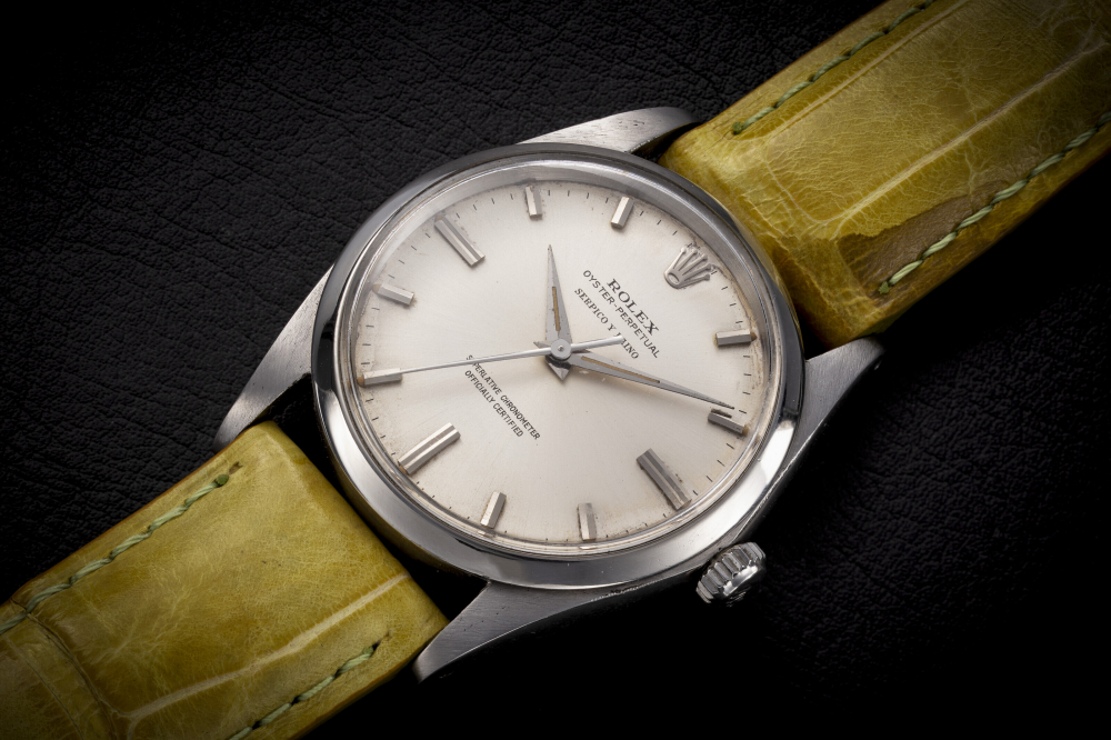 ROLEX, OYSTER PERPETUAL REF. 1018, A STEEL MANUAL-WINDING WRISTWATCH SIGNED BY ‘SERPICO Y LAINO’ - CASE
