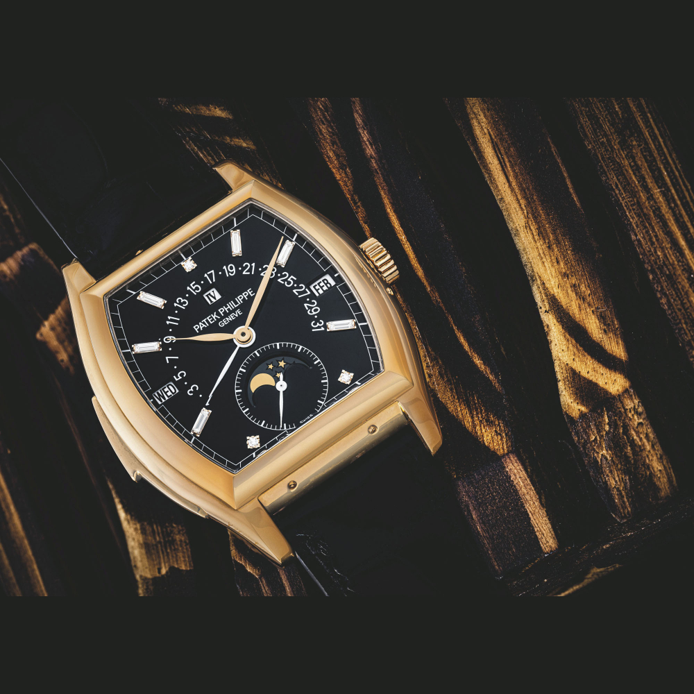 PATEK PHILIPPE. A POSSIBLY UNIQUE AND IMPORTANT 18K PINK GOLD AND DIAMOND-SET TONNEAU-SHAPED AUTOMATIC MINUTE REPEATING PERPEPTUAL CALENDAR WRISTWATCH WITH RETROGRADE DATE, MOON PHASES, LEAP YEAR INDICATION AND BLACK DIAL WITH DIAMOND-SET INDEXES