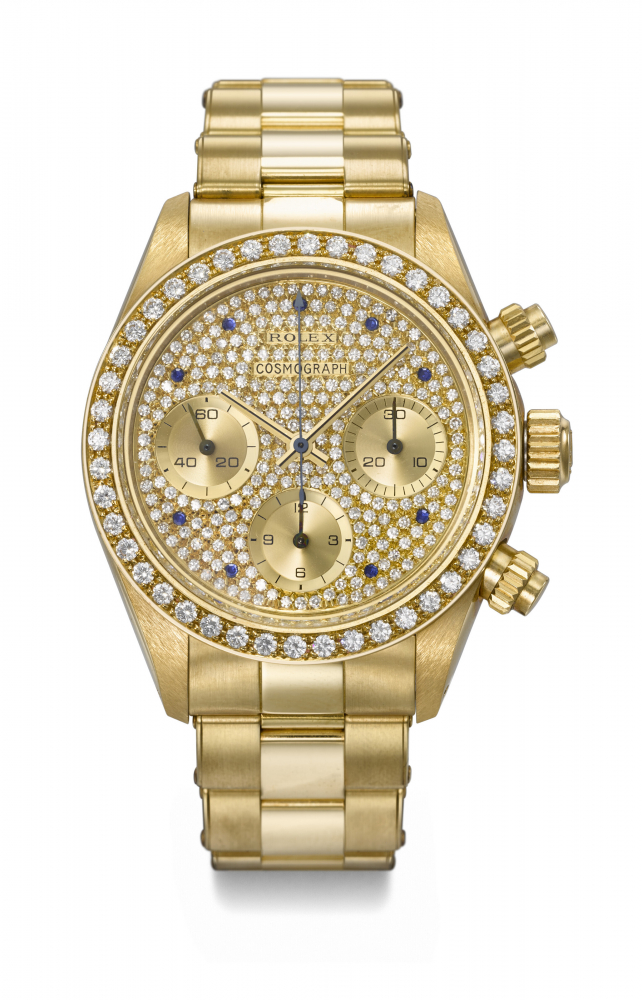 ROLEX. AN EXCEPTIONAL AND INCREDIBLY RARE 18K GOLD CHRONOGRAPH WRISTWATCH WITH DIAMOND-SET PAVÉ BEZEL, DIAMOND AND SAPPHIRE SET DIAL AND BRACELET, MADE FOR THE SULTANATE OF OMAN