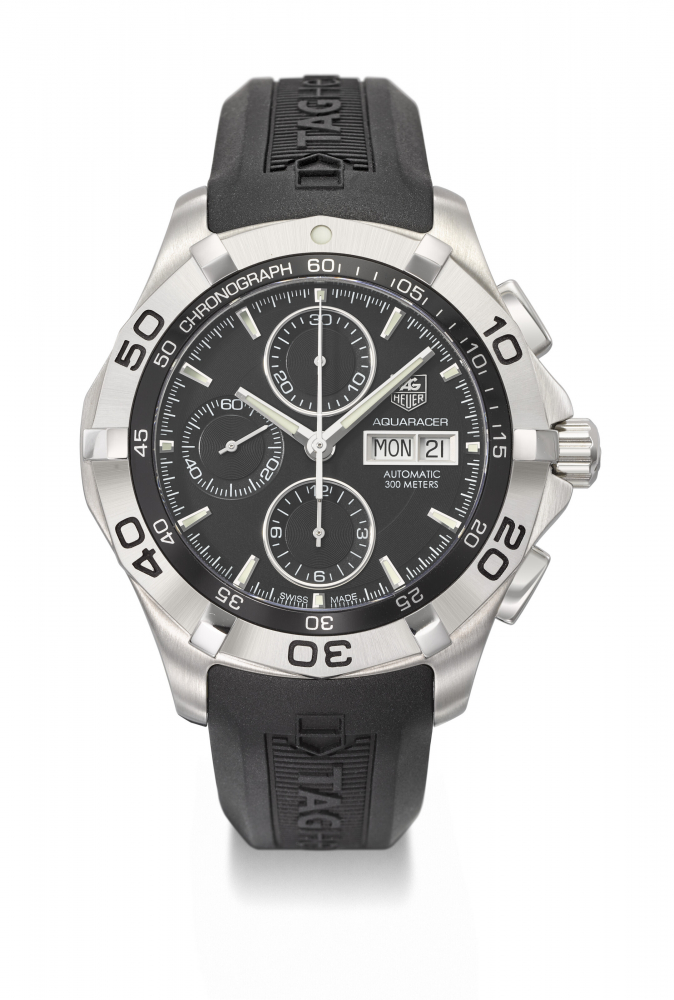 TAG HEUER. A STAINLESS STEEL LIMITED EDITION AUTOMATIC CHRONOGRAPH WRISTWATCH WITH DAY, DATE, MADE TO COMMEMORATE KIMI RAIKKONEN F1 WORLD CHAMPIONSHIP TITLE IN 2007