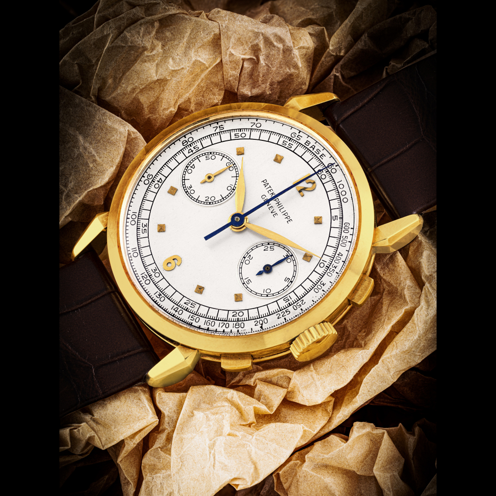 PATEK PHILIPPE. A VERY RARE 18K GOLD CHRONOGRAPH WRISTWATCH WITH TACHYMETER SCALE AND SPIDER LUGS
