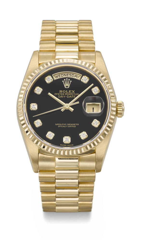 ROLEX. A HIGHLY ATTRACTIVE 18K GOLD AND DIAMOND-SET AUTOMATIC WRISTWATCH WITH SWEEP CENTRE SECONDS, DAY, DATE, ONYX DIAL AND BRACELET