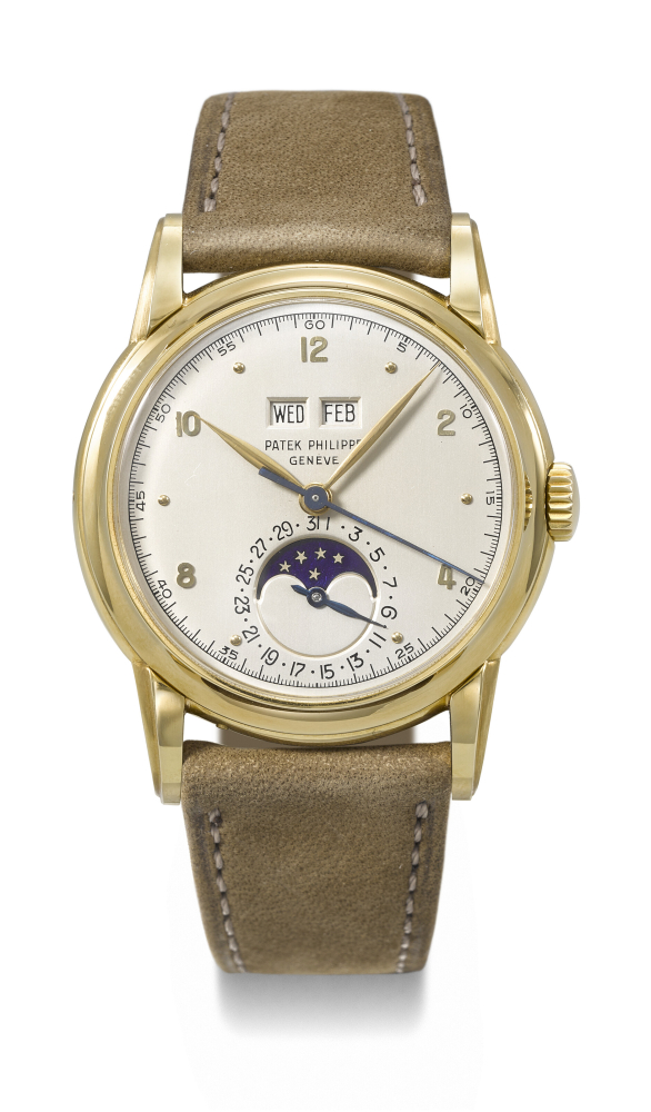 PATEK PHILIPPE. AN EXTREMELY RARE AND ELEGANT 18K GOLD PERPETUAL CALENDAR WRISTWATCH WITH SWEEP CENTRE SECONDS AND MOON PHASES