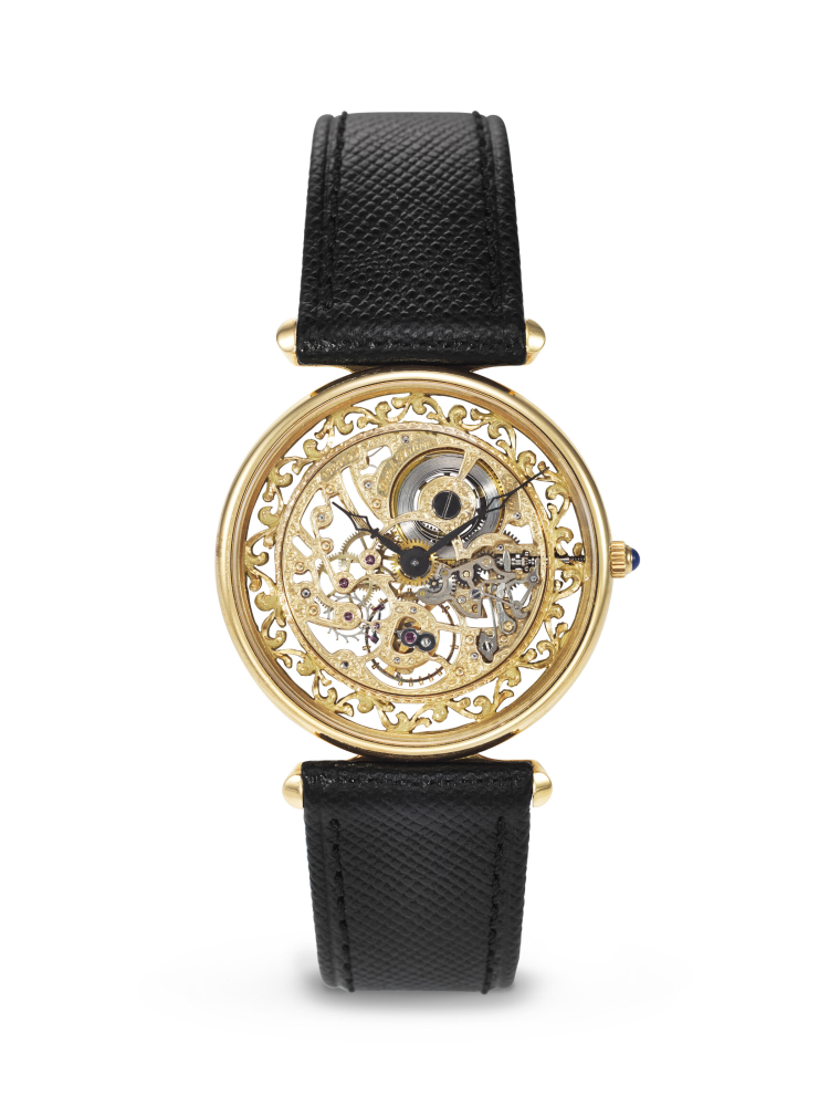 PATEK PHILIPPE. A RARE AND STUNNINGLY ATTRACTIVE 18K GOLD SKELETONIZED WRISTWATCH WITH HAND-ENGRAVED MOVEMENT
