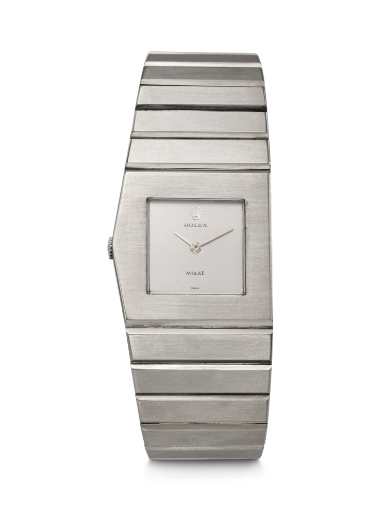 ROLEX. AN EXTREMELY RARE AND HEAVY 18K WHITE GOLD ASYMMETRIC LEFT HANDED WINDING WRISTWATCH WITH INTEGRAL 18K WHITE GOLD ‘KING MIDAS’ BRACELET