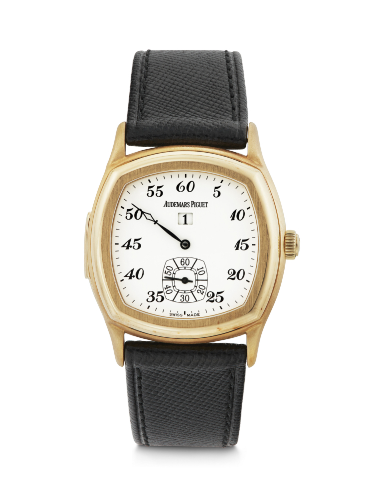 AUDEMARS PIGUET. A VERY RARE AND ATTRACTIVE 18K GOLD LIMITED EDITION CUSHION-SHAPED MINUTE REPEATING JUMP HOUR WRISTWATCH