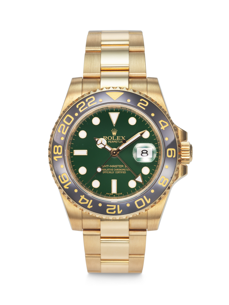 ROLEX. AN ATTRACTIVE AND COVETED 18K GOLD AUTOMATIC DUAL TIME WRISTWATCH WITH SWEEP CENTRE SECONDS, DATE AND BRACELET