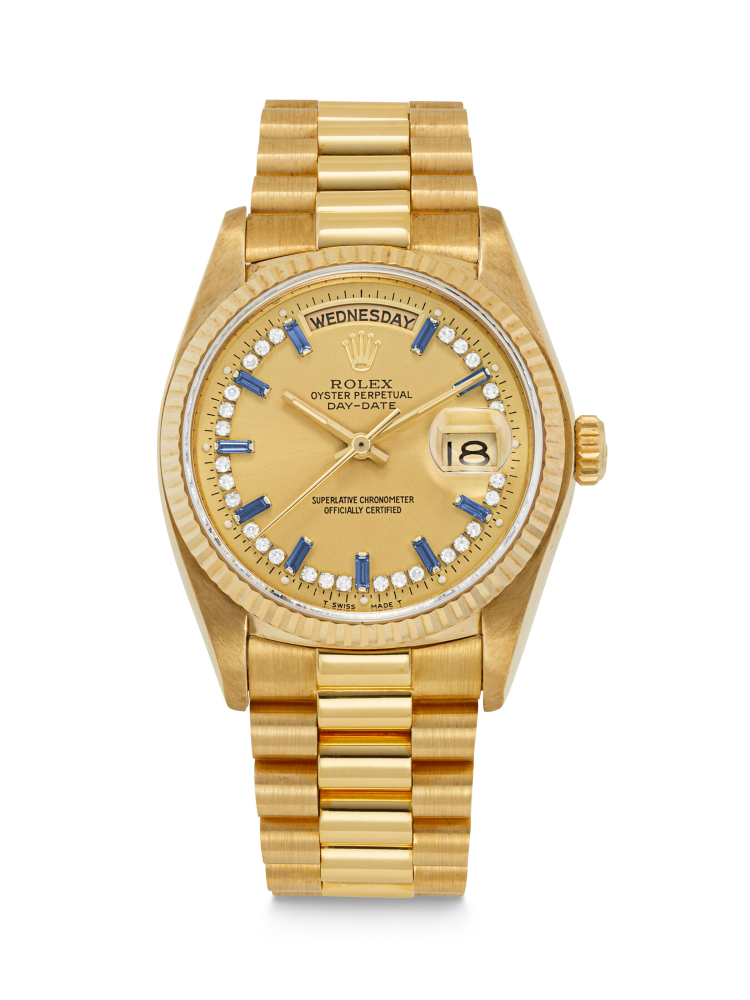 ROLEX. A RARE 18K GOLD, DIAMOND AND SAPPHIRE-SET AUTOMATIC WRISTWATCH WITH SWEEP CENTRE SECONDS, DAY, DATE AND BRACELET 