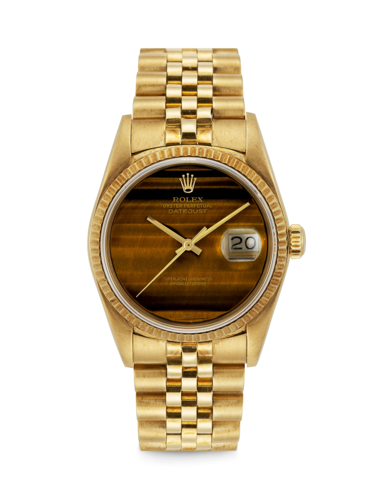 ROLEX. A RARE 18K GOLD AUTOMATIC WRISTWATCH WITH SWEEP CENTRE SECONDS, DATE, BRACELET AND TIGER’S EYE DIAL 