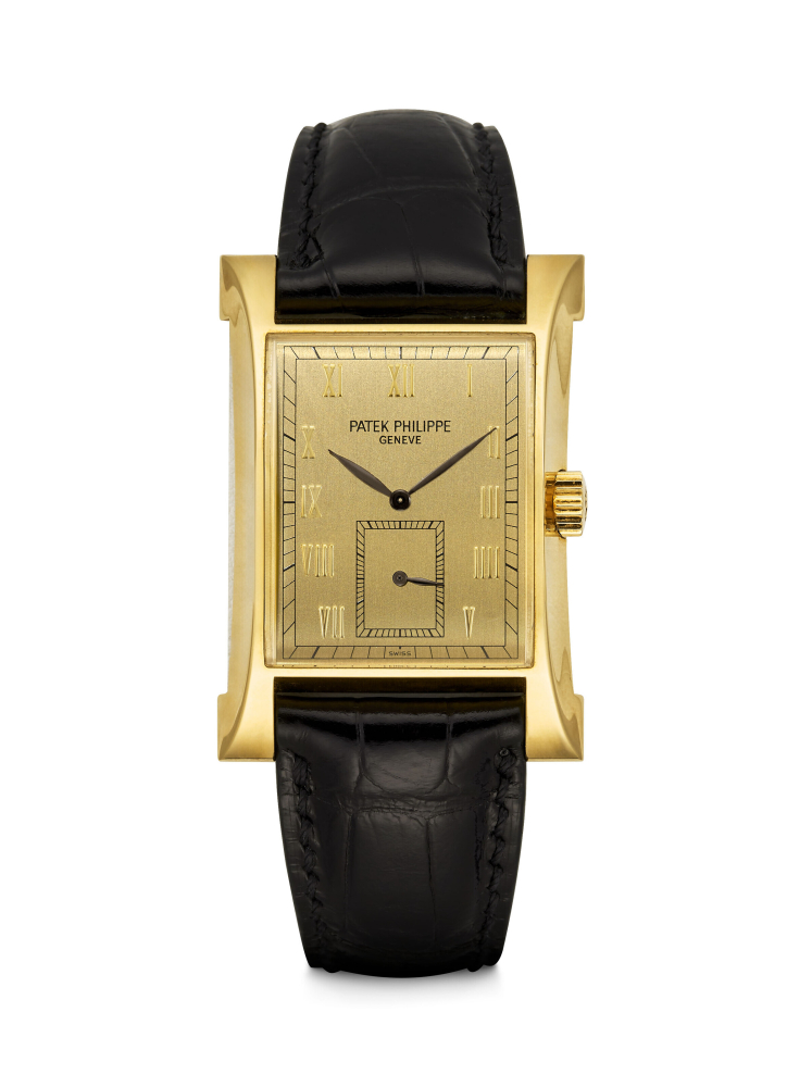 PATEK PHILIPPE. AN ATTRACTIVE 18K GOLD LIMITED EDITION RECTANGULAR WRISTWATCH, MADE TO COMMEMORATE THE INAUGURATION OF PATEK PHILIPPE’S NEW WATCHMAKING CENTRE IN 1997