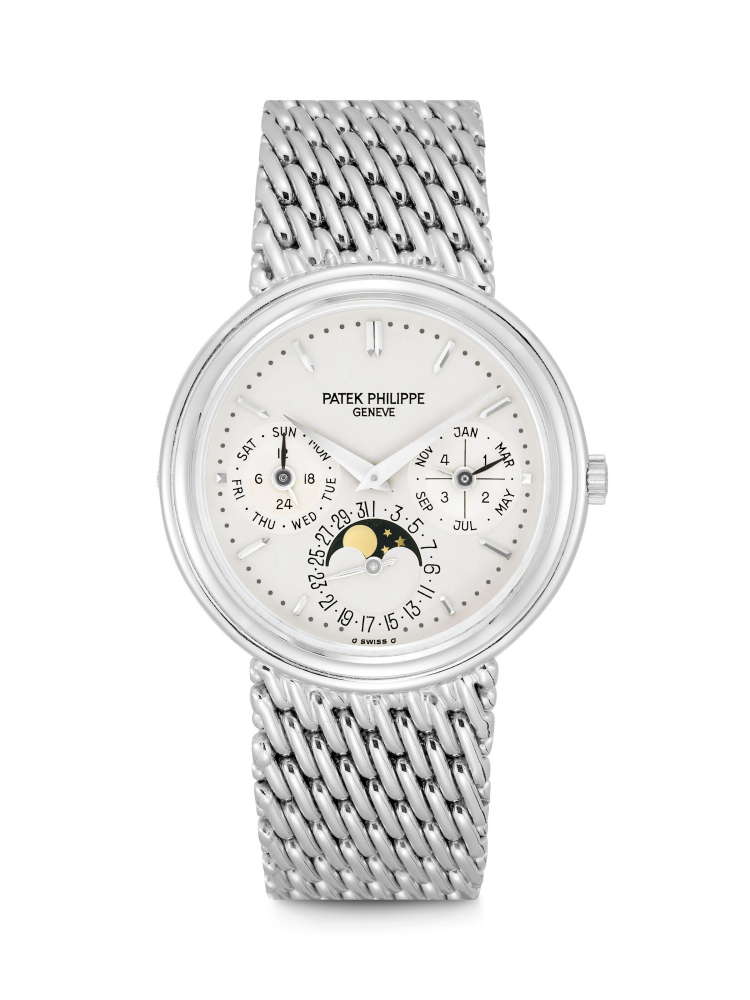 PATEK PHILIPPE. AN 18K WHITE GOLD AUTOMATIC PERPETUAL CALENDAR BRACELET WATCH WITH MOON PHASES, 24 HOUR AND LEAP YEAR INDICATION