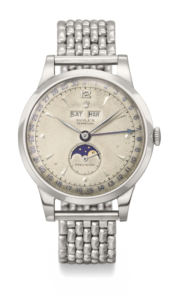 ROLEX. A VERY RARE AND CHARMING STAINLESS STEEL AUTOMATIC TRIPLE CALENDAR WRISTWATCH WITH MOON PHASES