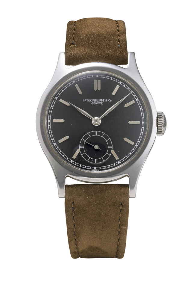 PATEK PHILIPPE. AN EXCEEDINGLY RARE AND HIGHLY ATTRACTIVE STAINLESS STEEL WRISTWATCH WITH BLACK DIAL