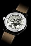 JAEGER-LECOULTRE. AN APPEALING PLATINUM AND CERAMIC LIMITED EDITION AUTOMATIC SEMI-SKELETONISED TOURBILLON WRISTWATCH WITH DUAL TIME, DATE AND DAY/NIGHT INDICATION, COLLABORATION WITH ASTON MARTIN