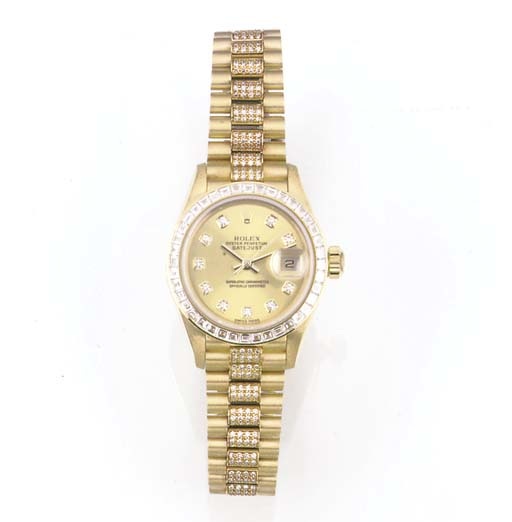 ROLEX, A LADY'S 18ct. GOLD DIAMOND SET AUTOMATIC CALENDAR CENTRE SECONDS WRISTWATCH.signed Rolex Oyster Perpetual Datejust, Superlative Chronometer Officially Certified, Ref: 79128, circa 2000.