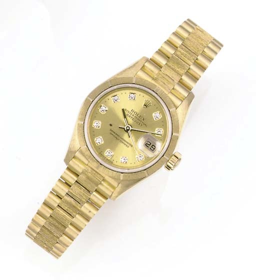 ROLEX, A LADY'S 18ct. GOLD AUTOMATIC CALENDAR CENTRE SECONDS WRISTWATCH signed Rolex Oyster Perpetual Datejust, Superlative Chronometer Officially Certified, Ref: 79278, circa 2000.