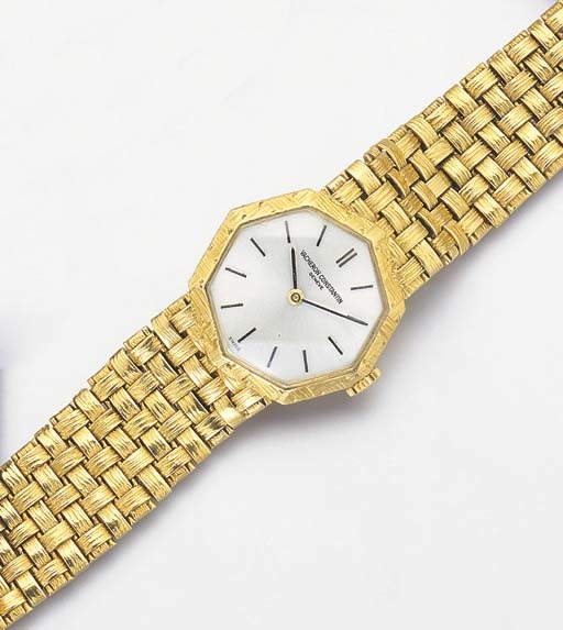 VACHERON & CONSTANTIN. A LADY'S 18K GOLD OCTAGONAL WRISTWATCH WITH BRACELET