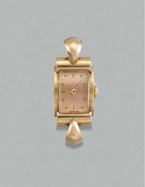 Patek Philippe. An lady's unusual 18K pink gold rectangular-shaped wristwatch