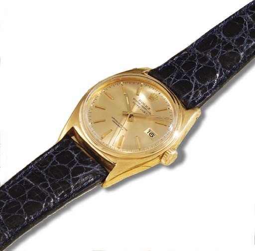 Rolex. An 18K gold self-winding waterproof wristwatch with sweep centre seconds and date