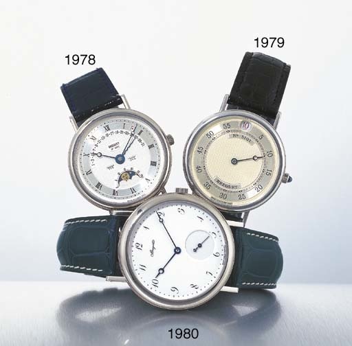 BREGUET. A FINE PLATINUM SELF-WINDING JUMP HOUR WRISTWATCH