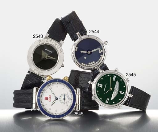 GERALD GENTA. AN 18K WHITE GOLD AND DIAMOND-SET AUTOMATIC WRISTWATCH