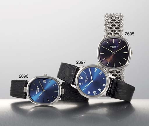 PATEK PHILIPPE. AN 18K WHITE GOLD CUSHION-SHAPED WRISTWATCH WITH BRACELET