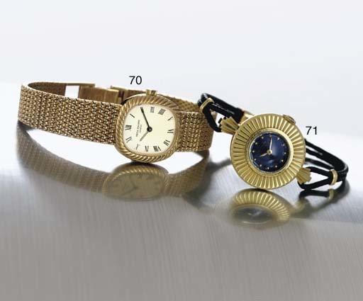 PATEK PHILIPPE. A RARE AND UNUSUAL LADY'S 18K GOLD WRISTWATCH WITH ENAMEL DIAL