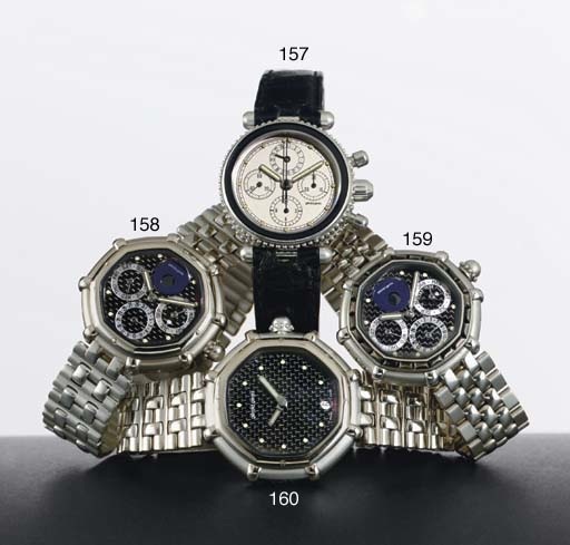 GERALD GENTA. A PLATINUM AND MOTHER-OF-PEARL OCTAGONAL PERPETUAL CALENDAR BRACELET WATCH WITH MOON PHASES