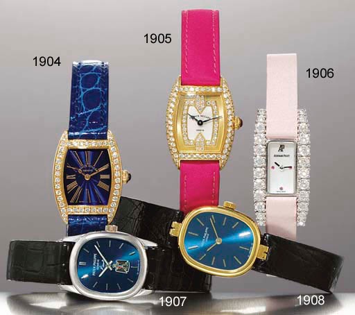 PATEK PHILIPPE. A FINE LADY'S 18K GOLD OVAL WRISTWATCH