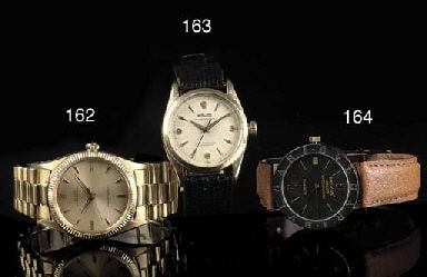 AN 18K GOLD AUTOMATIC WRISTWATCH WITH SWEEP CENTER SECONDS, BY ROLEX