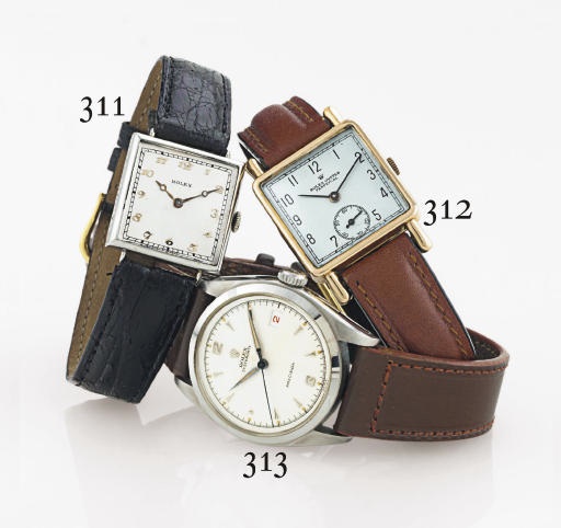 ROLEX. A STAINLESS STEEL WRISTWATCH WITH CENTER SECONDS AND DATE