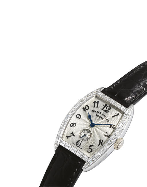 FRANCK MULLER. A FINE AND RARE LADY'S 18K WHITE GOLD AND BAGUETTE-CUT DIAMOND-SET TONNEAU-SHAPED WRISTWATCH