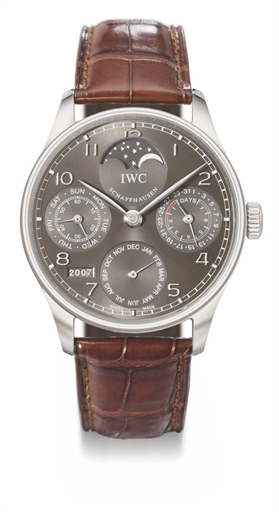 IWC. A fine and large 18K white gold perpetual calendar wristwatch with 7-day power reserve and moon phases