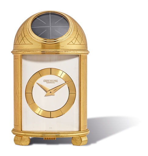 PATEK PHILIPPE, REF. 710.EARLY GILT BRASS SOLAR POWERED D