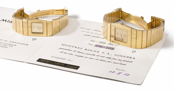 Rolex. A heavy and unusual 18K gold asymmetrical left-handed wristwatch with bracelet and original certificate