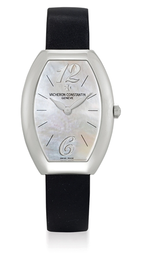 VACHERON CONSTANTIN. A LADY'S FINE 18K WHITE GOLD TONNEAU-SHAPED WRISTWATCH WITH MOTHER-OF-PEARL DIAL