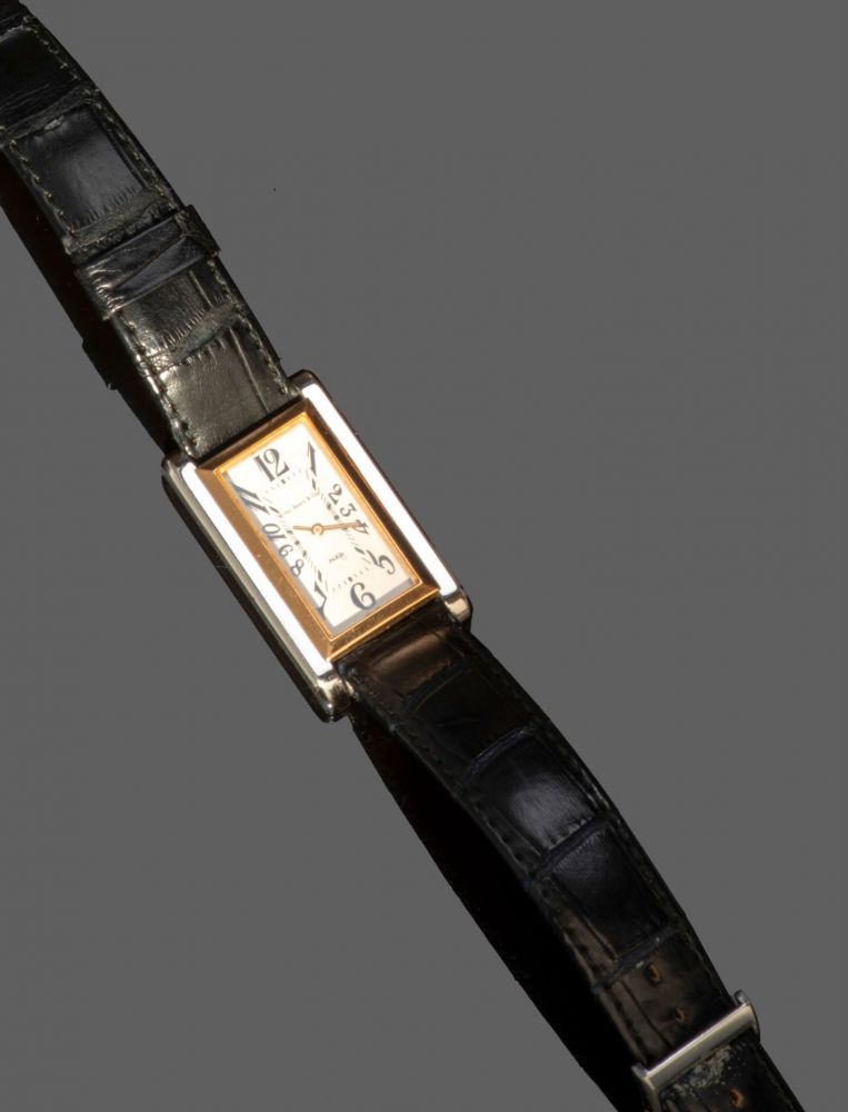 147. KIRBY BEARD & CO,Montre bracelet en... - Lot 147 - Cornette de Saint Cyr maison de ventes