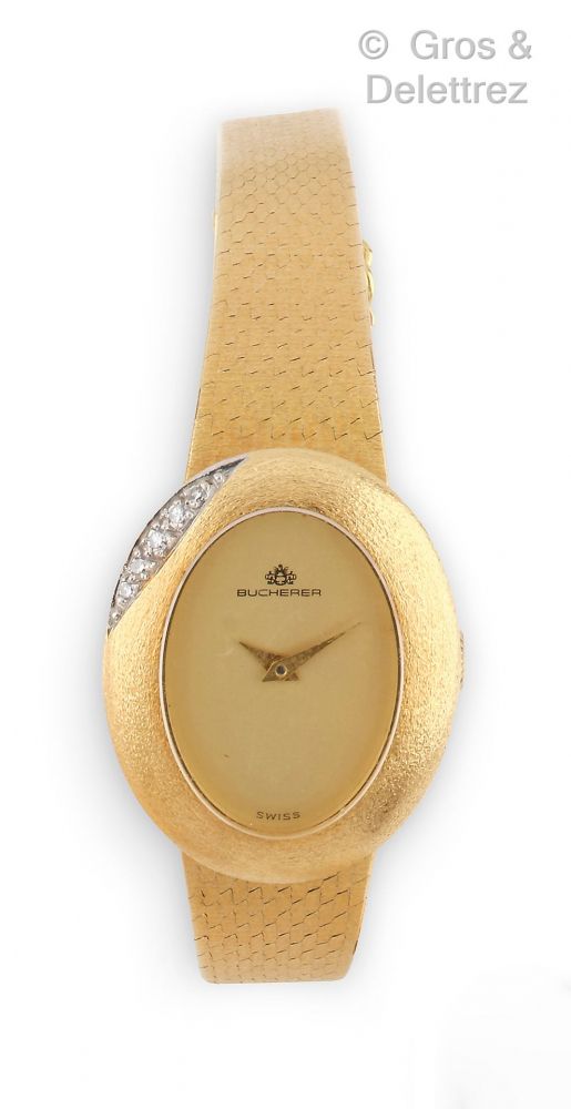 BUCHERER - Bracelet-montre de dame en or... - Lot 123 - Gros & Delettrez