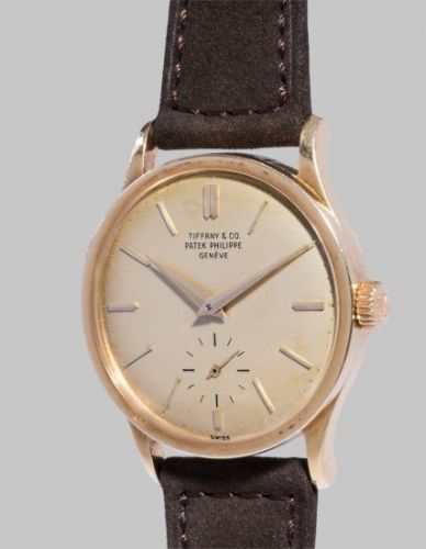 Patek Philippe Follow;Ref. 2597;A fine and rare yellow gold traveller's wristwatch with separately adjustable hour hand, retailed by Tiffany & Co.