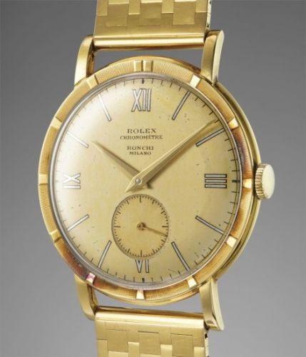 Rolex Follow;Ref. 4325;A rare and very well preserved yellow gold wristwatch with champagne dial and bracelet, retailed by Ronchi Milano