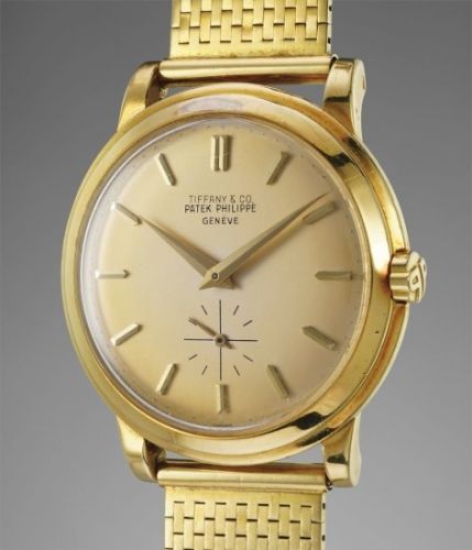 Patek Philippe Follow;Ref. 2552;An attractive and rare self-winding yellow gold wristwatch with bracelet, retailed by Tiffany & Co.
