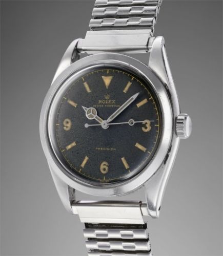 Rolex Follow;Ref. 6150;An attractive and historically important wristwatch with centre, seconds, black lacquer "explorer" dial and bracelet, worn on the 1955 Kanchenjunga Expedition by George Band