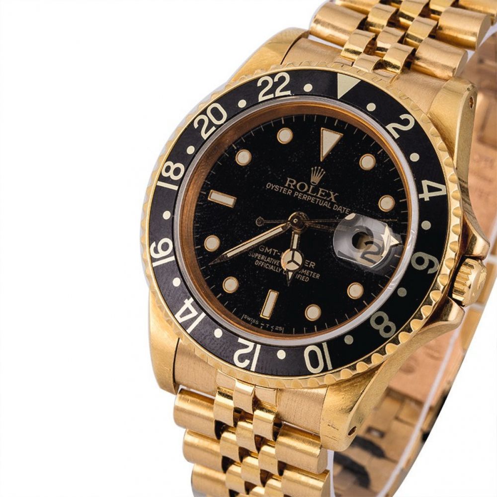 ROLEX | GMT-Master, Ref. 16758, A Yellow Gold Wristwatch with Bracelet Circa 1981