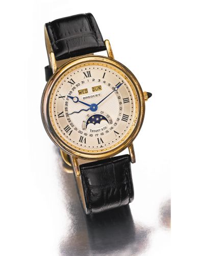 Breguet.RETAILED BY TIFFANY & CO: A FINE YELLOW GOLD AUTOMATIC WRISTWATCH WITH TRIPLE DATE AND MOON PHASES REF 3040 NO 3332 SERPENTINE CIRCA 1990
