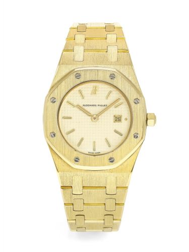 Audemars Piguet.A LADY'S YELLOW GOLD WRISTWATCH WITH DATE AND BRACELET NO 090 LADY ROYAL OAK CIRCA 1983.A LADY'S YELLOW GOLD WRISTWATCH WITH DATE AND BRACELET NO 090 LADY ROYAL OAK CIRCA 1983