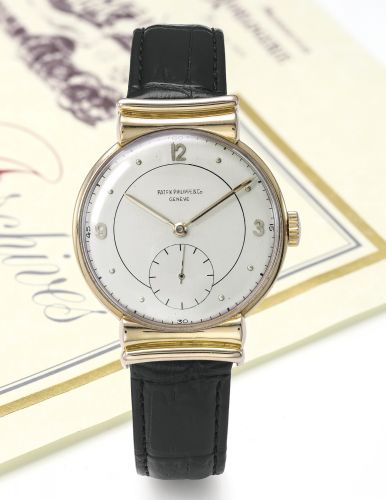 Patek Philippe & Co A RARE PINK GOLD WRISTWATCH REF 1585 MVT 967175 CASE 658950 MADE IN 1950