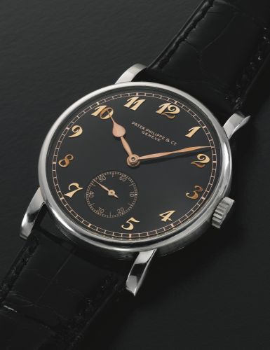 Patek Philippe A VERY RARE STAINLESS STEEL WRISTWATCH WITH BLACK DIAL AND BREGUET NUMERALS REF 1504 MVT 921092 CASE 623344 MADE IN 1941